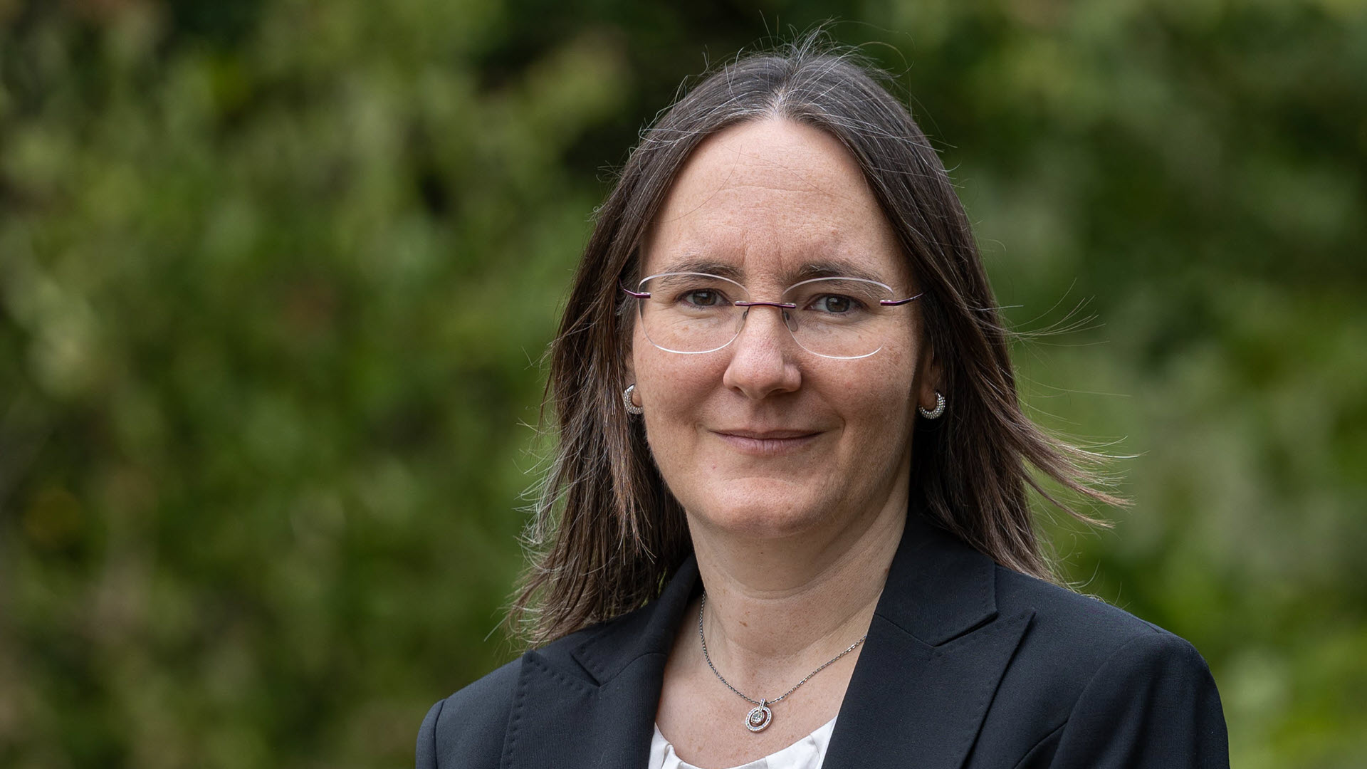 Dr. Corinne Jud Khan, Portrait
